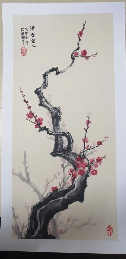 A tall painting of a twisting dark branch with red blossoms, Chinese calligraphy at the upper left, and red seals.